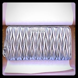 Miu Miu silver matelasse large zip wallet